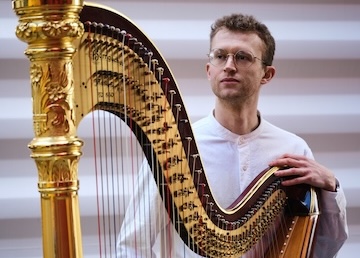 Oliver Wass with harp